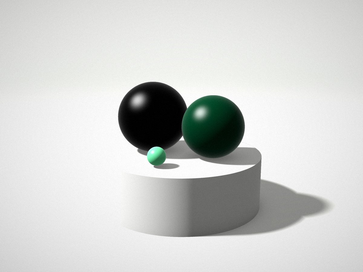 Two spheres, one ink and one green, resting together on a white plinth.